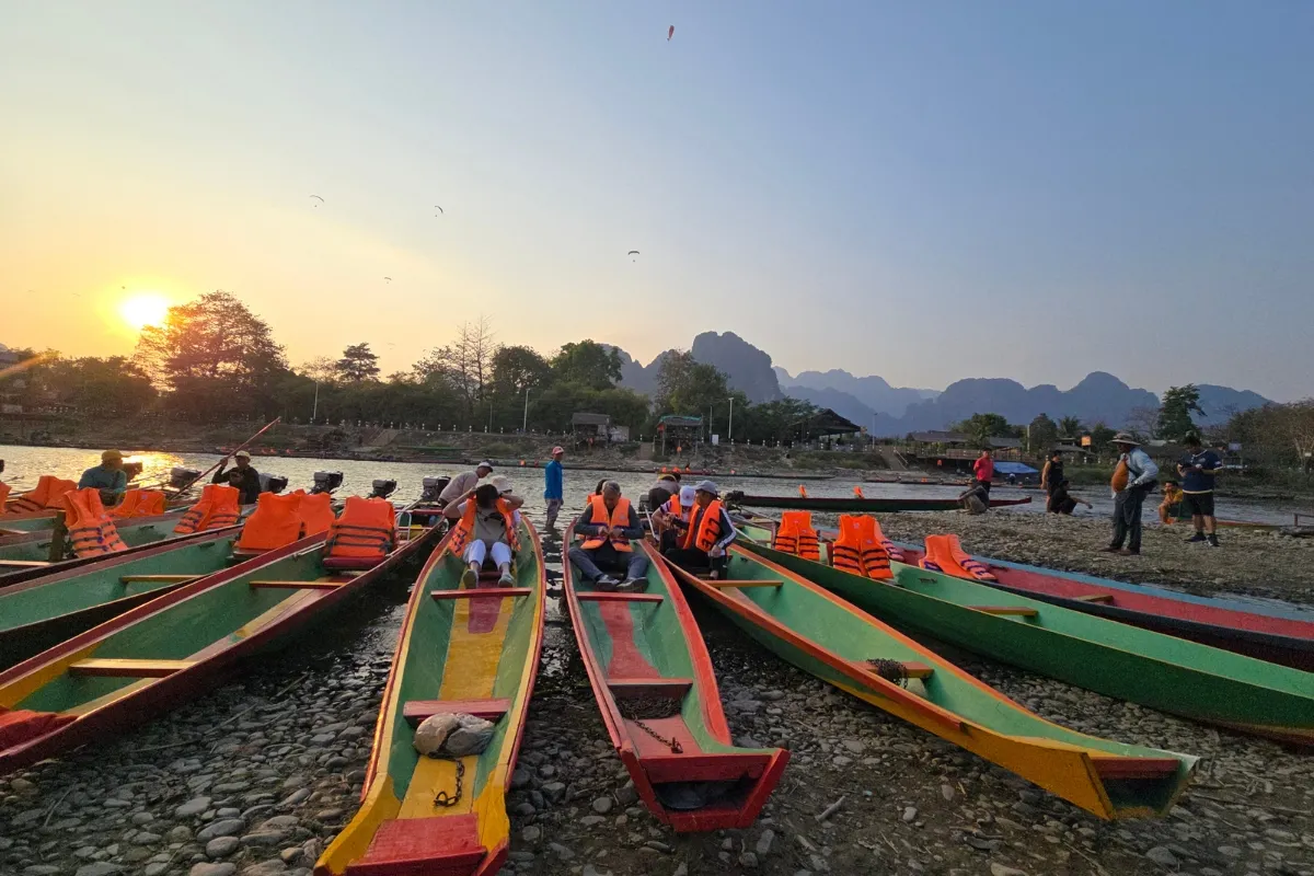 Full-Day Vang Vieng Highlights: Caves, Blue Lagoon & River Cruise