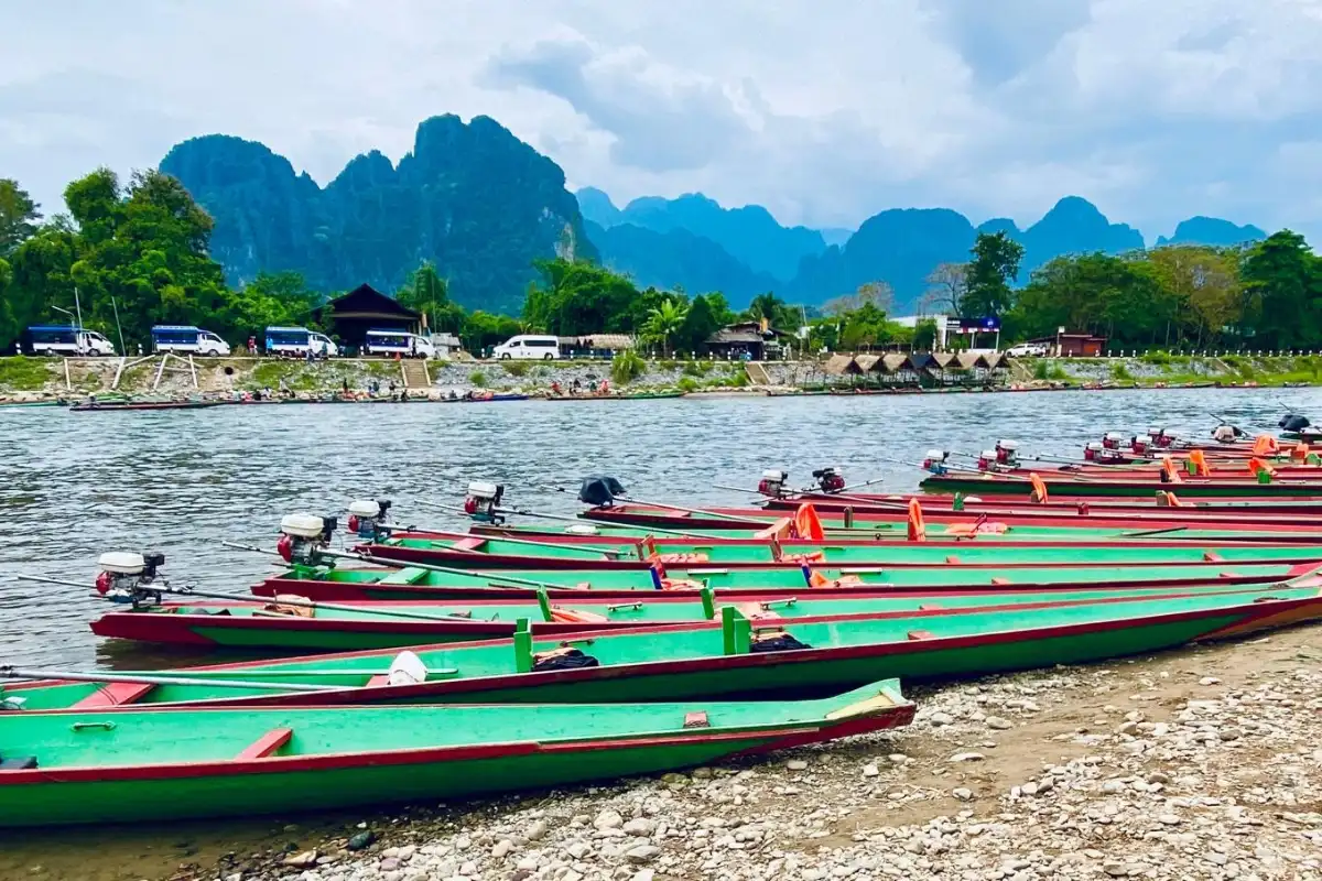 Full-Day Vang Vieng Highlights: Caves, Blue Lagoon & River Cruise