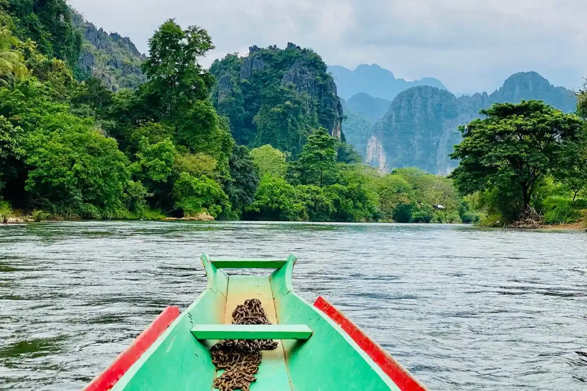 Full-Day Vang Vieng Highlights: Caves, Blue Lagoon & River Cruise