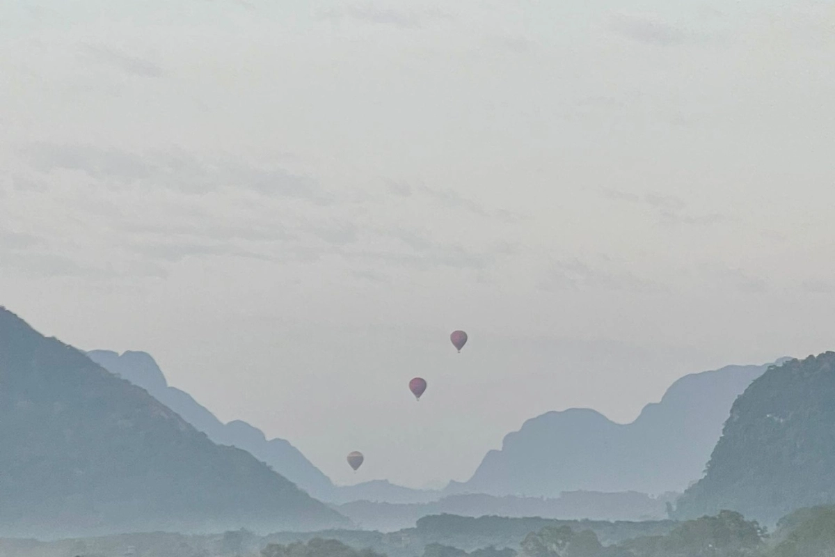 Full-Day Vang Vieng Highlights: Caves, Blue Lagoon & River Cruise