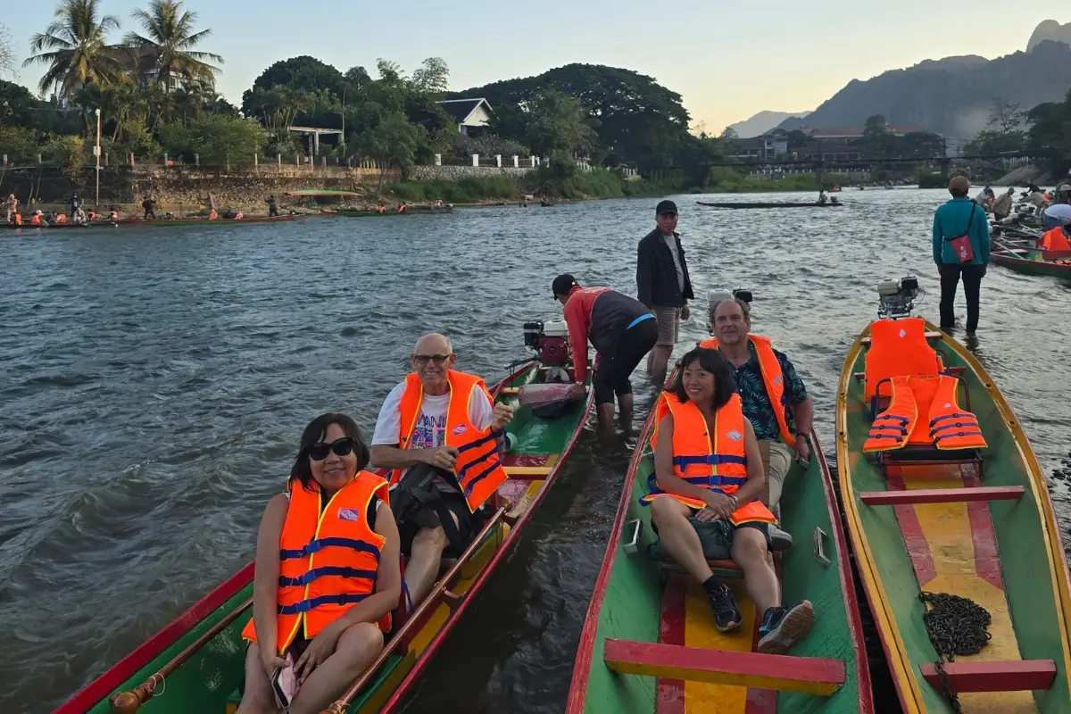 Full-Day Vang Vieng Highlights: Caves, Blue Lagoon & River Cruise